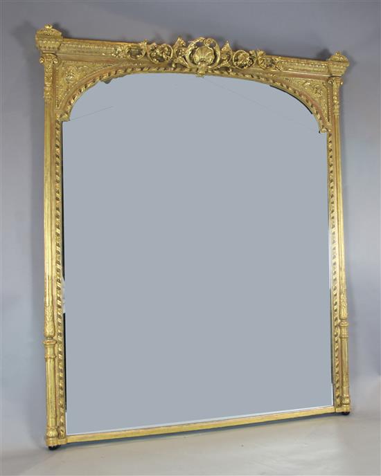 A ornate Victorian giltwood and gesso wall mirror, W.5ft 10in. H.6ft 11in.